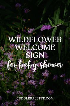 purple flowers with the words wildflower welcome sign for baby shower in white lettering on a black background