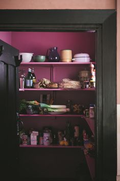 an open pantry filled with lots of food