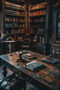 an old library filled with lots of books and leather chairs next to a wooden table