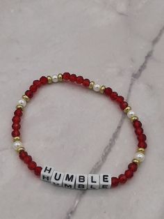 "Stretch Expression \"Humble\" bracelet.  Made with alphabet beads, red Swarovski crystals, white pearls and gold spacer beads.  Can be personalized for the holidays." Princess Necklace, Aquamarine Bracelet, Alphabet Beads, Word Bracelet, Gold Necklace Set, Red Necklace, Amethyst Bracelet, Healing Bracelets, Layered Bracelets