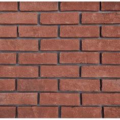 a red brick wall is shown in close up