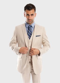 This tan three-piece suit is perfect for semi-formal occasions. The two-button single-breasted jacket features a slim notched lapel, welt pocket on chest and flap pockets at the waistline, and four interior pockets. The lining is pic-stitched to prevent the lining from showing. The single-breasted vest has a high-cut neckline. Pants are flat-fronts with angled front pockets and two buttoned back pockets. Pants are lined to the knee. Details: Includes: Suit Jacket, Vest, and Pants JACKET: Full Li Three Piece Suit, Single Breasted Jacket, Suit Vest, 3 Piece Suits, Formal Occasion, Modern Fit, Semi Formal, Suit Jacket, Two By Two