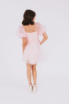 Embrace your inner royalty with our Queen Of Blushing Dress! This stunning dress features puffy sleeves and a sweetheart neckline for a romantic touch. Perfect for any special occasion, let your blushing beauty shine through. Details Puffy sleeves Sweetheart neckline Fully lined Sizing Approximate measurements: SIZE LENGTH BUST XSmall 32" 30" Small 32" 32" Medium 33" 34" Large 34" 36" Fabric has no stretchModel is 5’8 wearing small Material 100% PolyesterHand wash coldHang dry Angel Sleeve, Blush Dresses, Sweetheart Dress, Puffy Sleeves, A Romantic, Stunning Dresses, Dresses Xs, Sweetheart Neckline, Dresses For Sale