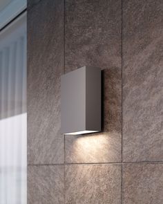 The Flat Box Up/Down Outdoor Wall Light offers a minimalist design, featuring a simplistic form radiating upward and downward LED illumination. Available finished in Textured Bronze, Textured Gray, or Textured White. Rated for wet locations. cETL and cUL listed. ADA compliant. Sonneman Lighting, Metal Lamp, White Led Lights, Led Wall Lamp, Led Module, Led Wall Lights, Wall Light Fixtures, Light Sconces, Led Wall