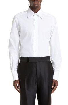 Standout details like tulip-edge mitered cuffs and mother-of-pearl buttons put Tom Ford's stamp on this Italian-made poplin shirt tailored in a slim fit. 33" length; 44" chest (size 44) French placket Cutaway collar Mitered, two-button cuffs 100% cotton Machine wash, line dry Made in Italy Designer Clothing Formal Shirt With Cuffed Sleeves And Fold Down Collar, Classic Formal Dress Shirt With Cuffed Sleeves, Designer Collared Dress Shirt For Formal Occasions, Designer Formal Collared Dress Shirt, Designer Formal Shirt With Button Closure, Designer Formal Shirt With Buttons, Elegant Formal Dress Shirt With Cuffed Sleeves, Luxury Fitted Dress Shirt, Designer Fitted Shirt With Button Cuffs