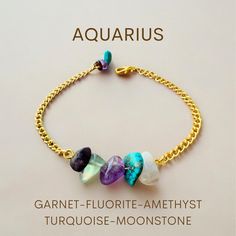 Aquarius Zodiac Bracelet | Innovation & Freedom Gemstones | Gift Box and Gift Card Embrace the innovative and free-spirited energy of Aquarius with this unique gemstone bracelet. Designed for those born under the sign of the Water Bearer (January 20 - February 18), this bracelet features a captivating blend of Garnet, Fluorite, Amethyst, Turquoise, and Moonstone--gemstones known to resonate with Aquarius's independent spirit, humanitarian nature, and forward-thinking vision. This bracelet is mor Symbolic Gemstone Bracelet As Gift, Spiritual Zodiac Sign Bracelet Gift, Spiritual Natural Stones Jewelry For Birthday Gift, Mineral Crystal Bracelets With Natural Stones For Gift, Gift Bracelets With Natural Stones And Mineral Crystal, Natural Stone Mineral Crystal Bracelets As Gift, The Water Bearer, Moonstone Gemstones, Aquarius Sign