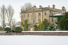 a large house in the middle of winter