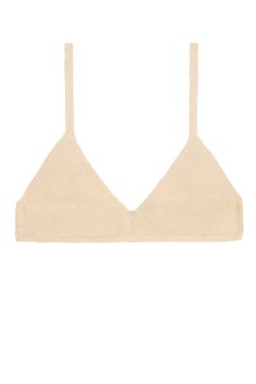 Cozy summer knit bra top with large hook closure. Cream fabric is 100% linen. Ella is 6' tall, 35" bust, 26" waist, 36" hip, and is wearing a size S. Fitted Beige Top For Beachwear, Beige Fitted Top For Beachwear, Fitted Beige Beachwear Top, Beige Linen Crop Top For Beach, Fitted Cropped Bra For Loungewear, Cropped Fitted Bra For Loungewear, Summer Cropped Seamless Bra, Fitted Triangle Top Crop Top For Loungewear, Fitted Triangle Top With Adjustable Straps