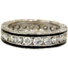 Modern Deco + Vintage Deco touch Ring is set with rounds diamonds & black enamel on outer, seems like 3 rings!! 2.26ct. diamonds Brilliant full cuts Channel mounted G-color, Si-1 clarity. 5.40mm thick (can not resize this one) Gorgeous gilt etching pattern on profile side of ring Current ring size: 8 Appraisal to accompany: $7000 Diamond Band Rings, Modern Deco, Round Diamond Ring, American Modern, Deco Vintage, Platinum Metal, Diamond Rings Bands, Antique Diamond, Diamond Eternity