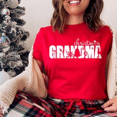 "Christmas Grandma Shirt, Grandma Santa Shirt, Grandma Christmas Gift, Matching Christmas Shirts, Matching Family Christmas Hello! Welcome to Virgo Design Boutique! I am a Virgo :) I may overthink and over-analyze everything. I like to do everything right the first time. I am meticulous and perfectionist in everything I do. Every product you buy will reach you with the same care and perfection. You can be sure of that :) * High quality and super soft, comfortable shirt. Made with top of the line Virgo Design, Grandmas Christmas, Matching Christmas Shirts, Xmas Wishes, Christmas Gifts For Grandma, Honeymoon Shirts, Womens Christmas Shirts, Sister Outfits, Big Sister Shirt