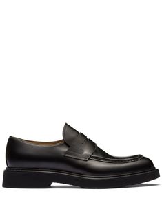 black calf leather smooth grain panelled design penny slot seam detailing oversize tongue round toe slip-on style branded leather insole leather sole Classic Black Slip-ons With Stitched Sole, Black Calf Leather Slip-ons With Textured Sole, Calf Leather Platform Loafers With Rubber Sole For Business, Business Platform Loafers With Rubber Sole In Calf Leather, Black Slip-ons With Stitched Sole For Business, Business Platform Loafers With Stitched Sole And Almond Toe, Business Platform Loafers With Calf Leather, Black Business Slip-ons With Stitched Sole, Business Almond Toe Platform Loafers With Stitched Sole