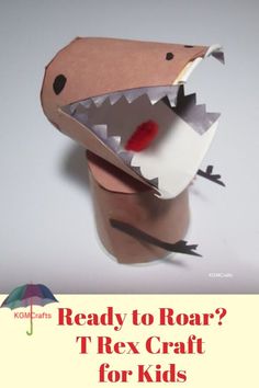 an origami dinosaur with its mouth open and the words ready to roar? tex craft for kids