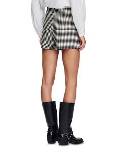 Experience unmatched style and versatility with our Asymmetric Houndstooth Shorts. Featuring a unique asymmetrical design, these shorts are perfect for any occasion. Made from high-quality materials, they provide comfort and durability. Asymmetric snap-hook panel at front Piped pocket Houndstooth print Shell: 55% acrylic/36% polyester/8% viscose/1% elastane; lining: 100% polyester; pocket lining: 100% cotton Dry clean Colour may vary due to lighting on images. The product images (without model) Asymmetrical Design, Checks, Lighting