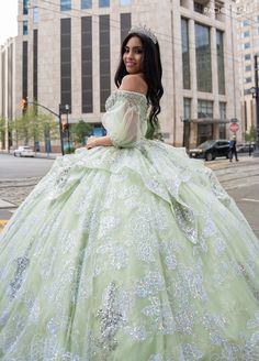 Light up the room in this beaded applique long off shoulder puff sleeve dress with A-line skirt by Rachel Allan RQ3128. Discover elegance and grace in this tulle ballgown. This romantic ballgown radiates with sophistication and is sure to leave a lasting impression. The off-the-shoulder neckline is hand beaded with applique and fringed detailing, adding a regal look to the entire silhouette. Detachable tulle sleeves provide a subtle vintage touch and a lace-up back offers the ultimate fit. As yo Off Shoulder Puff Sleeve Dress, Off Shoulder Puff Sleeve, Tulle Ballgown, Mary's Bridal, Shoulder Puff Sleeve, Cinderella Divine, Quince Dress, Tulle Sleeves, Dresses Quinceanera