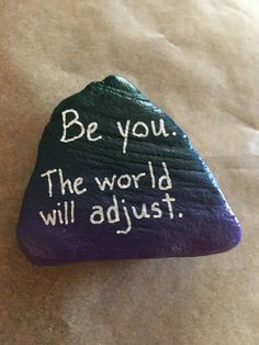 a rock with writing on it that says, be you the world will adjut