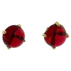 The French Yellow Gold Stud Earrings with Red Glass Cabochons are a striking and elegant addition to any jewelry collection. Crafted from luxurious 18kt yellow gold, these earrings showcase a timeless design with a vibrant touch of color. Each earring features a beautiful Bordeaux red glass cabochon, prong set to enhance and display its deep, rich hue. The cabochon cut gives the glass a smooth, polished surface and a domed shape, which captures and reflects light beautifully, adding depth and lu French Yellow, Yellow Gold Stud Earrings, Style Français, Gold Stud Earrings, Gold Stud, Red Glass, Gold Studs, Gold Earrings Studs, Deep Red