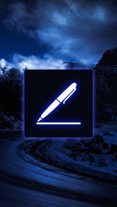 a pen that is sitting on top of a blue light in the dark night sky