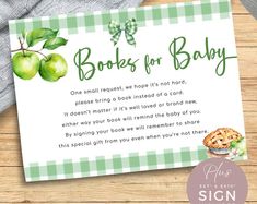 a baby shower book request with green apples and gingham checkered table cloth