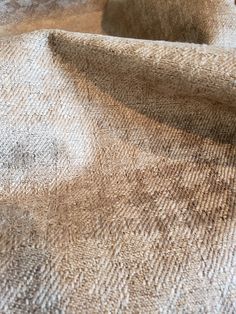 closeup of the textured fabric on an upholstery material, with no pattern