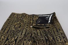 Step into the realm of high fashion with these exquisitely crafted Dolce & Gabbana evening pants. Designed to make a statement, these pants feature a luxurious black and gold jacquard pattern that exudes elegance and sophistication. Perfect for formal events, they are brand new with tags and boast intricate logo details. Meticulously made in Italy, they are a must-have for those who appreciate the blend of style and high-quality craftsmanship. Color: Gold Black Material: 14% Metal, 86% PL Countr Evening Pants, Pants Model, Formal Pants, Jacquard Dress, Jacquard Pattern, Dolce E Gabbana, Sweaters And Jeans, Guess Jeans, Dress Trousers