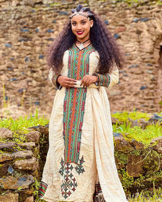 Embrace the beauty of Ethiopian heritage with this stunning traditional dress. Featuring elegant patterns and a flowing design, it captures the essence of cultural pride and grace. Perfect for any special occasion, this dress exudes timeless beauty and sophistication Holiday Wedding Dress, Beautiful Ethiopian, Habesha Dress, Ethiopian Traditional Dress, Ethiopian Dress, Holiday Wedding, Traditional Dress, Wedding Dresses Simple, British Indian