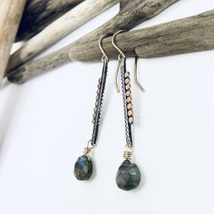 These best selling earrings are a total show stopper. Textured mixed metal bars are soldered together creating a unique dropping bar which leads to a flashing 8mm labradorite gemstone. Length: 2" Selling Earrings, Metal Bar, Jewelry Repair, Mixed Metals, Semi Precious Gemstones, Labradorite, Semi Precious, Jewelry Making, Texture