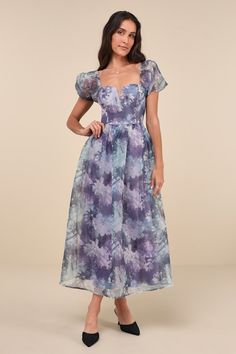 Let the romantic vibes of the Lulus Lovely Statement Purple Floral Organza Tie-Back Midi Dress make you feel effortlessly flirty for any special occasion! Airy woven organza, with a teal and white floral design throughout, shapes this gorgeous dress that features a princess-seamed bodice, a sweetheart neckline with a notched detail and supportive V-bar, and sheer puff sleeves (with elastic at the shoulders and cuffs). The high, fitted waist tops a twirl-worthy, skater-style skirt that finishes a Knot Tie Dress, Floral Organza Dress, Floral Dress Wedding Guest, Romantic Vibes, White Floral Design, Purple Midi Dress, Organza Dress, Evening Dresses Cocktail, Wedding Guest Dresses