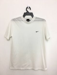 SVS 326 Vintage 90's NIKE Swoosh Tshirt Jersey Embroidery Logo Medium Size Made In Japan SIZE ON TAG ( M ) ⚡️MEASURES ABOUT (APPROXIMATELY) : - ARMPIT TO ARMPIT: 20 inch - LENGTH (BACK COLLAR DOWN): 26.5 inch ⚡️ ⚡️CONDITION *Good vintage condition Please check the measurement carefully before make a purchase.. ----------------------------------- Shipping Cost : $15 for Worldwide Shipping . Receiving the item within 14-21 business days... Ship with DHL E-COMMERCE. ----------------------------------- Payment : Accept "PAYPAL" Only Please contact to me with any questions. Please come again & have a nice day:) Thank you very much for  watching my items. Nike Vintage T Shirt, Nike Jersey T-shirt For Sports, Nike Vintage Tshirts, Nike Crew Neck Jersey T-shirt, 90s White T-shirt With Logo Print, Made In Japan, Medium Size, Embroidery Logo, Mens T