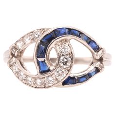 Year: 1950s Item Details: Ring Size: 7.25 Metal Type: Platinum [Hallmarked, and Tested] Weight: 6.1 grams Diamond Details: .30ct total weight, natural diamonds, E-F Color, VS Clarity, Transitional Round Cut & Straight Baguette Cut Sapphire Details: Natural, Blue, Baguette Cut, .40ct total weight. Band Width: 1.6 mm Condition: Excellent Sapphire Cocktail Ring, Vintage Sapphire, Fun Jewelry, Baguette Cut, Sapphire Diamond, Jewelry Rings Engagement, Ring Size 7, Cocktail Ring, Cocktail Rings