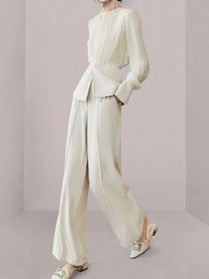 Size Chart S: Bust 82cm, Waist 62cm, Hip 84cm, Shoulder 36cm, Sleeve 57cm, Length 57cm, Pants Length 104cm M: Bust 86cm, Waist 66cm, Hip 88cm, Shoulder 37cm, Sleeve 58cm, Length 58cm, Pants Length 105cm L: Bust 90cm, Waist 70cm, Hip 92cm, Shoulder 38cm, Sleeve 59cm, Length 59cm, Pants Length 106cm XL: Bust 94cm, Waist 74cm, Hip 96cm, Shoulder 39cm, Sleeve 60cm, Length 60cm, Pants Length 107cm NOTE: 1. There is 2-3 cm different according to manual measurement. 2. Please check the size chart carefully before order the item. 3. Please note that slight color difference should be acceptable due to the light and screen. Model Show Outerwear Outfits, Ivory Suit, Chic Outerwear, Office Fashion Women, Fitted Blouses, Long Trousers, Outerwear Outfit, Pantalon Large, Fashion Korean