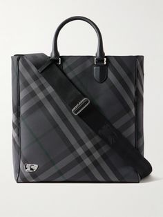 Burberry's tote bag is perfectly sized to fit the essentials for long work commutes or overnight trips.Topped with sturdy handles, it's jacquard-woven with the house's signature checks and features an internal zipped pocket to keep smaller items organised. There's enough space for a change of clothes plus a laptop and water bottle. Use the optional shoulder strap to wear it cross-body. Designer Double Handle Bags For Business Trips, Business Coated Canvas Shoulder Bag With Handles, Business Shoulder Bag In Coated Canvas With Handles, Business Shoulder Bag In Coated Canvas, Business Shoulder Bag With Coated Canvas, Designer Tote Bags For Business Trips, Black Bags With Detachable Handle For Business Trips, Black Bag With Detachable Handle For Business Trips, Black Bags For Business Trips With Detachable Handle