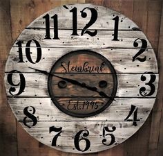 a clock made out of wood with numbers on it