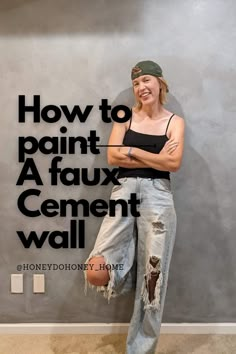 a woman leaning against a wall with her arms crossed and the words how to paint a faux cement wall