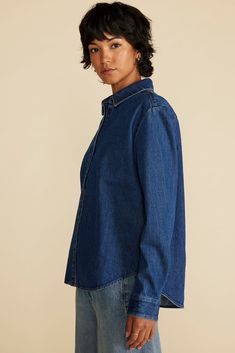 A quintessential denim shirt, Bixby has it all: classic styling, a casual and easy-care fabric, and subtle details that make it feel special. Wear it with everything.  DESIGN- Classic fit. Choose your usual size.- Traditional long sleeve shirt with a spread collar, exposed front placket, and buttons at the collar and cuffs.- Urea buttons- Length: 25 1/2"- Part of a matching setFABRIC & CARE- 100% organic cotton denim- Ethically made in China.- Machine wash cold.SUSTAINABILITY- This product was c Dark Wash Tops For Everyday Fall Wear, Dark Wash Long Sleeve Tops For Everyday, Everyday Dark Wash Long Sleeve Tops, Classic Washed Blue Shirt For Workwear, Classic Tops With Medium Wash And Spread Collar, Classic Indigo Shirt For Spring, Classic Unstructured Denim Blue Tops, Classic Medium Wash Tops For Casual Gatherings, Classic Medium Wash Shirt For Work