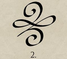 the number 2 is written in black ink on a white paper with an intricate design