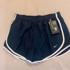 Dark Blue (Navy) With Either Stripe Running Short. Has Underwear Lining And Have Never Been Worn. Casual Navy Nike Athletic Shorts, Navy Nike Sporty Athletic Shorts, Nike Navy Shorts For Summer, Soccer Wishlist, Blue Nike Athletic Shorts For Running, Navy Nike Sports Shorts, Blue Nike Athletic Shorts, White Nike Pros, Nike Blue Training Shorts