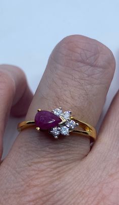 Vintage Pink Ruby Golden 925 Sterling Silver Band Ring https://www.etsy.com/listing/1195005509/vintage-pink-ruby-golden-925-sterling?utm_source=crowdfire&utm_medium=api&utm_campaign=api Teardrop Hallmarked Ring For Anniversary, Hallmarked Teardrop Anniversary Ring, Teardrop Vvs Clarity Rings As Gift, Cluster Rings With Center Stone As Gift, Ruby Ring With Vs Clarity For Gift, Brilliant Cut Ruby Cluster Ring As Gift, Cluster Rings With Center Stone For Gifts, Pear-shaped Cluster Ring As Gift, Diamond Teardrop Ring For Gift