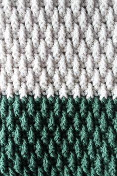 two different colors of crochet on top of each other, one green and the other white