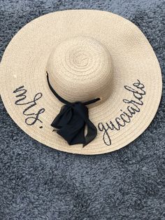 Pick from the typical straw hat or a black straw hat! Customize with the bride to be new last name or the newly married friends new last name. Perfect for the honeymoon! Black straw hat will have wording in white and other straw hat will have wording in black. I can do other wording or sayings, just reach out to me to discuss. Also able to make as gifts for your bridesmaids too! Summer Straw Hat With Curved Brim For Wedding, Personalized Adjustable Hats For Wedding, Summer Hats For Bachelorette Party, Beach Straw Hat, Black Straw Hat, Newly Married, Bride To Be, Bridesmaids Gifts, Straw Hat