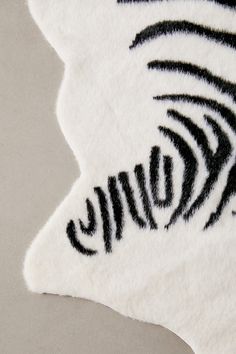 a close up view of a zebra print rug