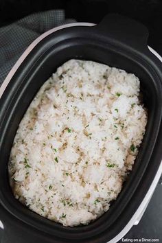 rice is cooked in the slow cooker and ready to be eaten for lunch or dinner