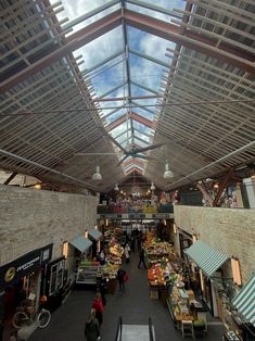 an overhead view of a market with people shopping