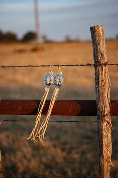 Extra Long Fringe Earrings - Leather Earrings -Western Jewelry- Concho Earrings -Tassel Earrings - Tassel - Fringe concho - Western ConchoThis is for sure the one of the best sellers in my store. Those earrings are SUPER lightweight. The slotted conchos are light and so is the deerskin leather 3mm that i use. This is a must have in your collection. I PROMISE YOU! I offer a SUPER large selection of colors just for you! People love them and tell me all the time how many compliments they have with Southwestern Fringe Dangle Earrings, Southwestern Tassel Earrings, Traditional Fringe Earrings, Real Turquoise Earrings, Western Jewelry Necklace, Cowgirl Earrings, Concho Earrings, Rodeo Jewelry, Turquoise Stone Jewelry