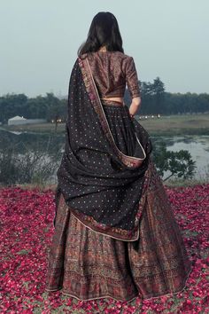 Black vegan silk lehenga with an attached cancan and floral weaving pattern. Comes with a padded blouse and a dupatta. - Aza Fashions Black Banarasi Silk Festive Sets, Black Unstitched Chanderi Lehenga, Black Raw Silk Lehenga For Festivals, Black Raw Silk Sets For Festivals, Designer Black Art Silk Lehenga, Black Silk Dupatta For Reception, Black Raw Silk Anarkali Set For Festivals, Black Chanderi Lehenga With Traditional Drape, Black Art Silk Lehenga With Cutdana