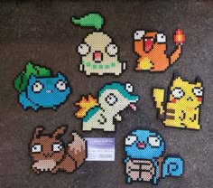 some pixel art pieces are on the floor