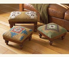 an ottoman and foot stool in a living room