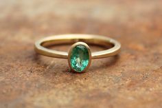 18k Ring With Emerald | Etsy Modern Green Emerald Promise Ring, Minimalist Emerald Ring For Formal Occasions, Minimalist Oval Green Emerald Ring, Minimalist Green Oval Emerald Ring, Elegant Green Emerald Ring With Bezel Setting, Gold Rings For Women, Ring With Emerald, Single Stone Ring, Solitaire Rings