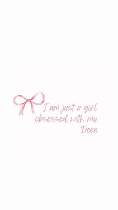 a pink ribbon on top of a white card with the words i am just a girl dressed with, my dear