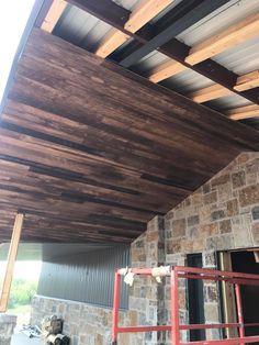 the roof is being installed and ready to be installed on the house's front porch