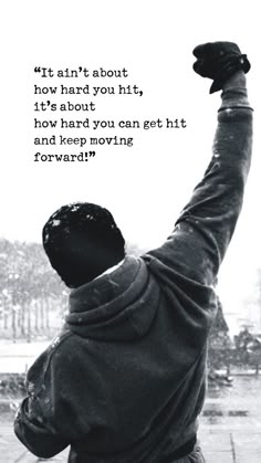 a black and white photo of a man raising his arms in the air with a quote above it